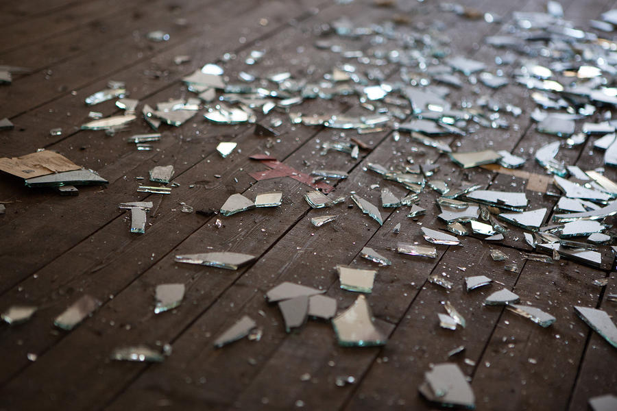 Photo of broken glass on floor